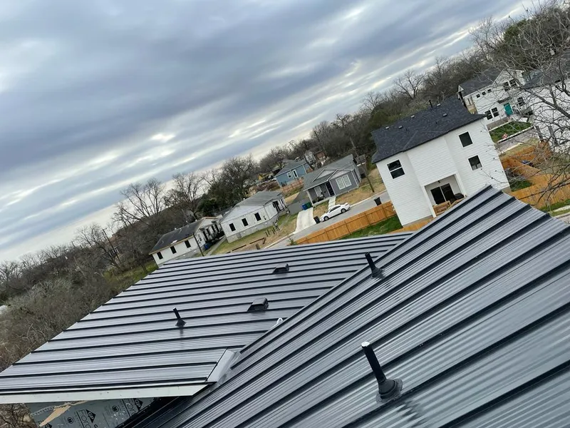 Standing seam metal roof panels with vents for Skylight Repair in Ypsilanti